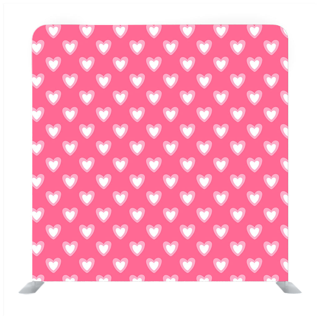 Pink background with white heart pattern media wall - Backdropsource