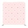 Pink  hearts on baby pink background Media wall - Backdropsource