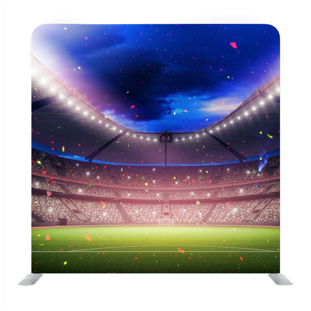 Night stadium arena Football field championship win! Confetti and tinsel. Blue toning background Media Wall - Backdropsource