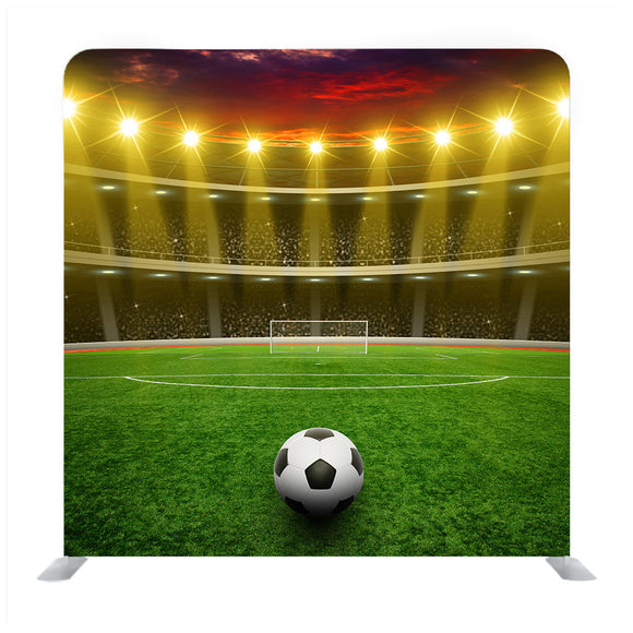 Soccer Ball On Green Stadium, Arena In Night Illuminated Bright Spotlights Background Media Wall - Backdropsource