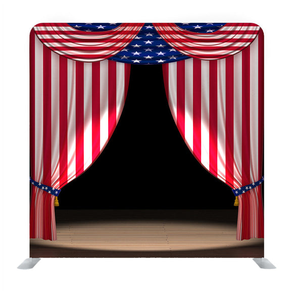 Three Dimensional Render Of Theater Curtains In The Colors Of The USA Flag With A Spotlight On Stage Background Media Wall - Backdropsource