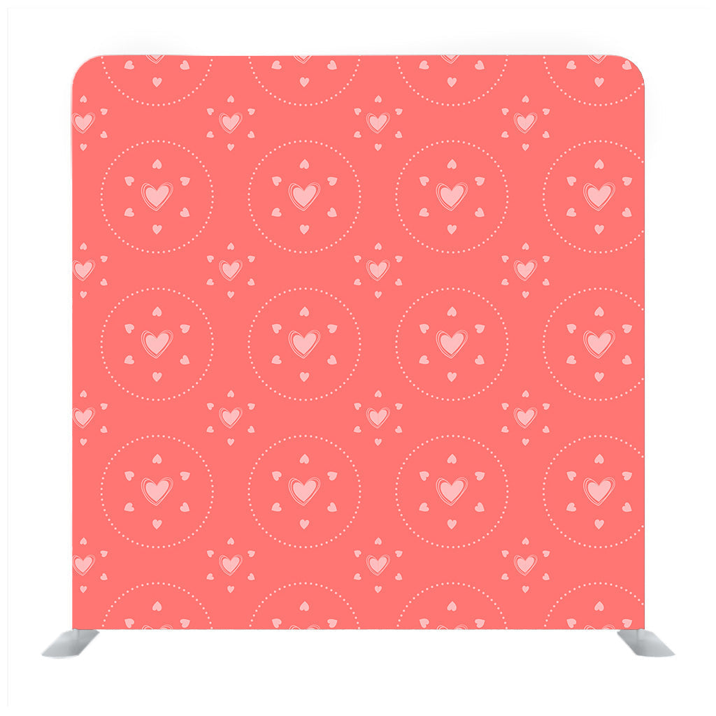 White polka heart pattern on pastel orange Background Media wall - Backdropsource