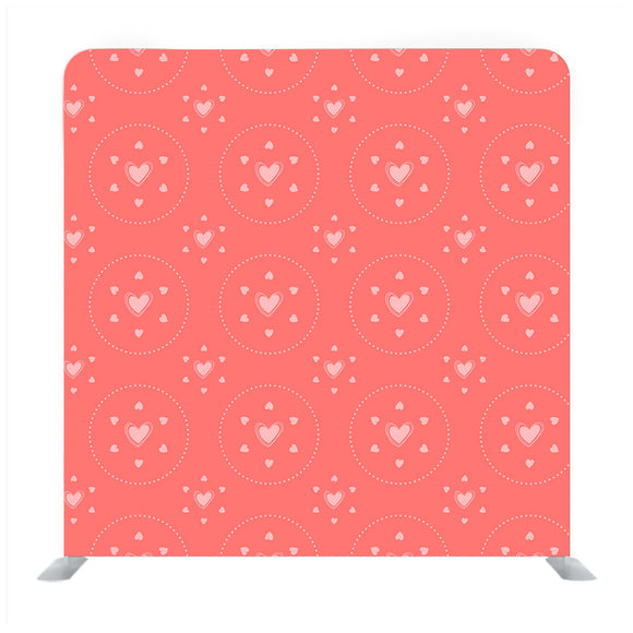 White polka heart pattern on pastel orange Background Media wall - Backdropsource